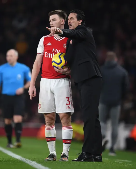 Framed Print : Strategic Discussions: Unai Emery and Kieran Tierney at Arsenal's Emirates Stadium