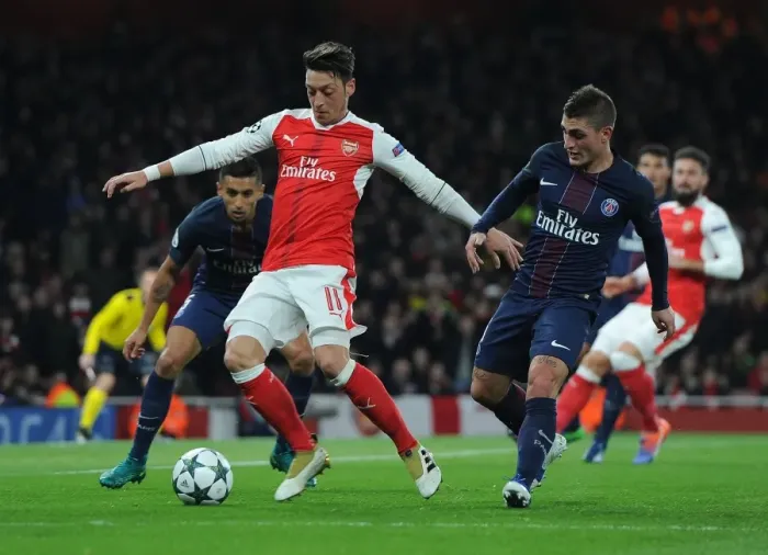 Framed Print : Strategic Showdown: Ozil vs. Verratti - Arsenal vs. Paris Saint-Germain, Champions League Clash Framed Print : Strategic Showdown: Ozil vs. Verratti - Arsenal vs. Paris Saint-Germain, Champions League Clash