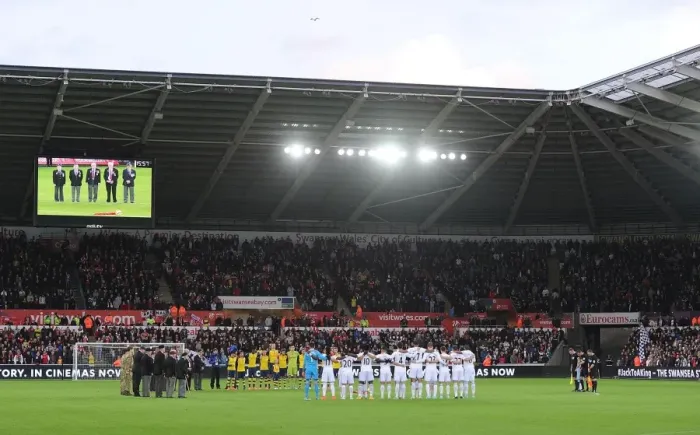 Framed Print : Swansea vs Arsenal: Premier League Showdown - Moment of Silence (November 2014) Framed Print : Swansea vs Arsenal: Premier League Showdown - Moment of Silence (November 2014)