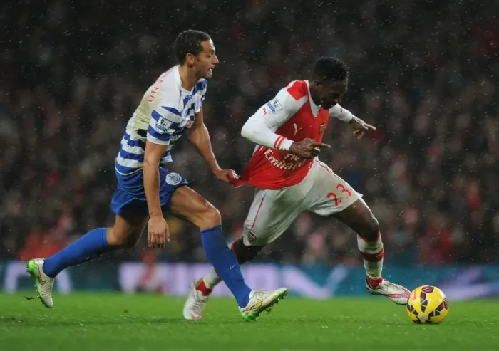Framed Print : Tense Clash: Welbeck vs. Ferdinand at Arsenal vs. QPR Framed Print : Tense Clash: Welbeck vs. Ferdinand at Arsenal vs. QPR