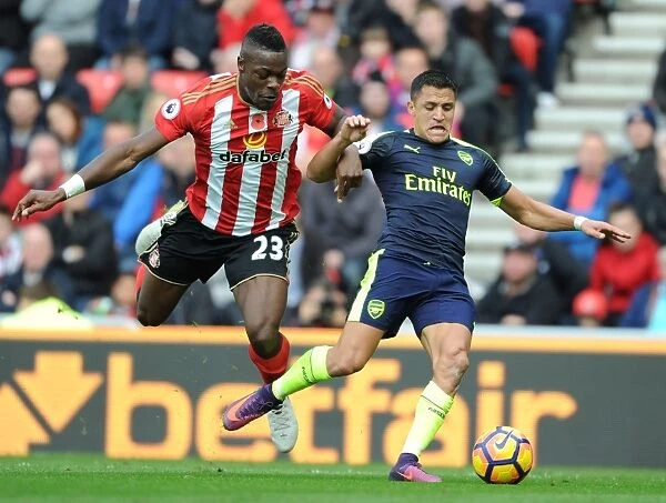 Tense Encounter: Alexis Sanchez vs Lamine Kone at Sunderland vs Arsenal