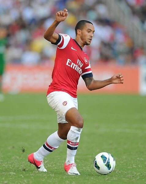 Theo Walcott in Action: Arsenal Forward Shines Against Kitchee FC, 2012