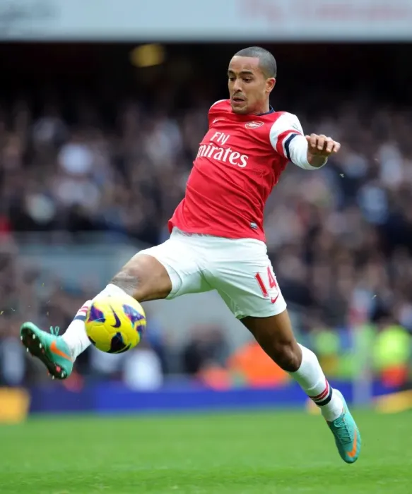 Framed Print : Theo Walcott in Action: Arsenal vs. Tottenham Premier League Clash 2012-13 Framed Print : Theo Walcott in Action: Arsenal vs. Tottenham Premier League Clash 2012-13