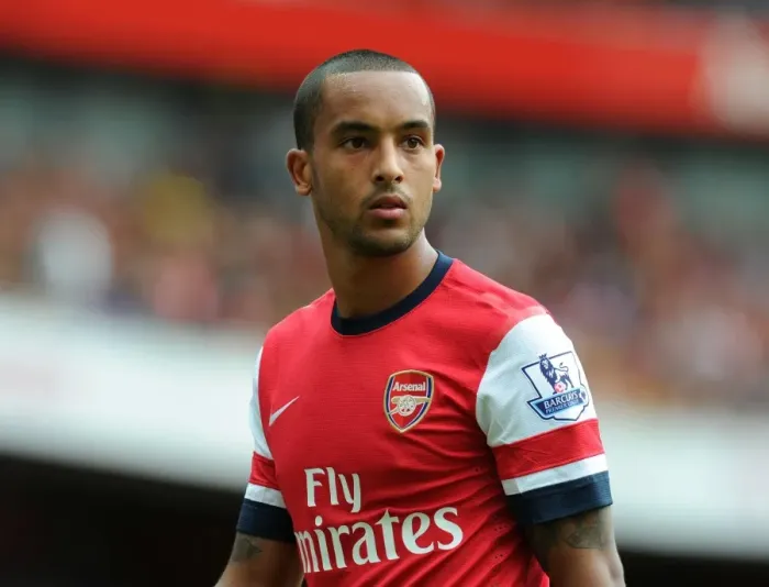 Framed Print : Theo Walcott in Action: Arsenal vs. Tottenham Premier League Clash 2013-14 Framed Print : Theo Walcott in Action: Arsenal vs. Tottenham Premier League Clash 2013-14