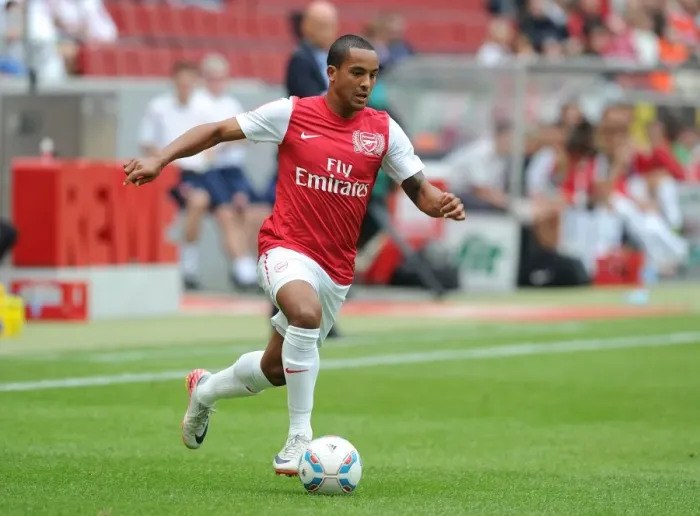 Framed Print : Theo Walcott in Action: Arsenal vs Cologne Pre-Season Friendly (2011) Framed Print : Theo Walcott in Action: Arsenal vs Cologne Pre-Season Friendly (2011)