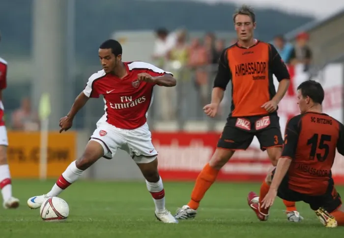 Framed Print : Theo Walcott in Action: Arsenal's Star Forward vs Burgenland, Austria 2008 Framed Print : Theo Walcott in Action: Arsenal's Star Forward vs Burgenland, Austria 2008