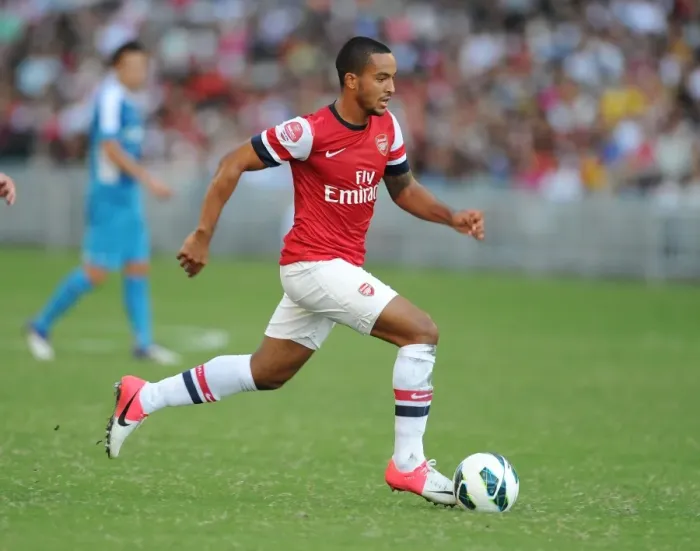 Framed Print : Theo Walcott in Action: Arsenal's Star Forward vs Kitchee FC (2012-13)