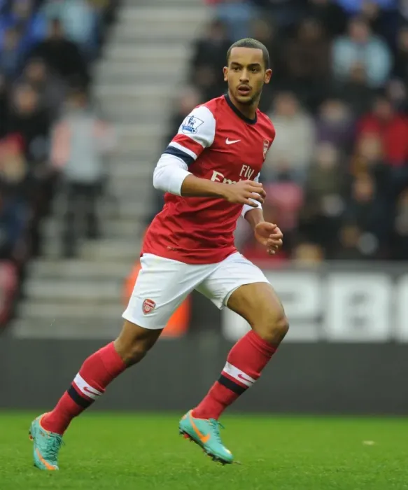 Framed Print : Theo Walcott in Action: Wigan Athletic vs. Arsenal, Premier League 2012-13