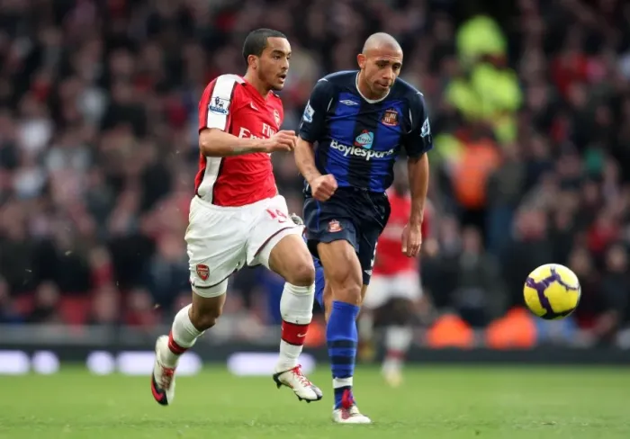 Framed Print : Theo Walcott (Arsenal) Anton Ferdinand (Sunderland). Arsenal 2: 0 Sunderland Framed Print : Theo Walcott (Arsenal) Anton Ferdinand (Sunderland). Arsenal 2: 0 Sunderland
