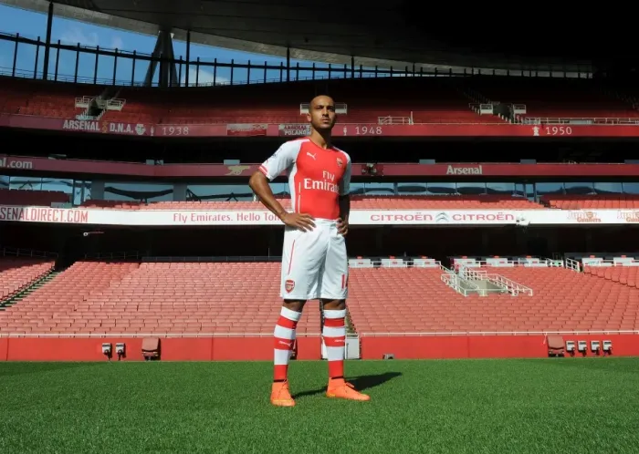 Framed Print : Theo Walcott (Arsenal). Arsenal 1st Team Photocall. Emirates Stadium, 7  /  8  /  14. Credit