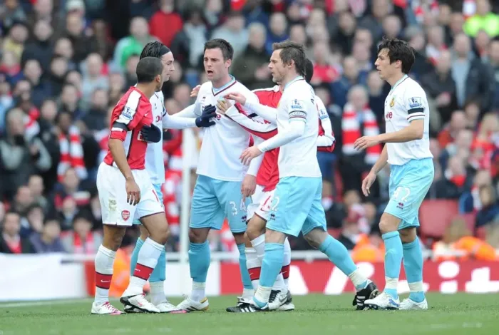 Framed Print : Theo Walcott (Arsenal) clashes with Daniel Fox (Burnley). Arsenal 3: 1 Burnley Framed Print : Theo Walcott (Arsenal) clashes with Daniel Fox (Burnley). Arsenal 3: 1 Burnley