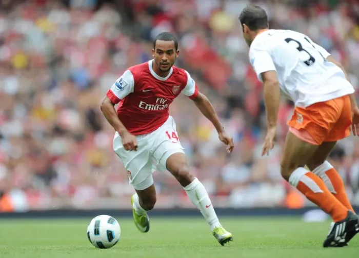 Framed Print : Theo Walcott (Arsenal) Dekel Keinan (Blackpool). Arsenal 6: 0 Blackpool Framed Print : Theo Walcott (Arsenal) Dekel Keinan (Blackpool). Arsenal 6: 0 Blackpool