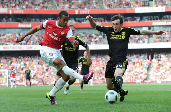 Framed Print : Theo Walcott (Arsenal) Jack Robinson (Liverpool). Arsenal 1: 1 Liverpool Framed Print : Theo Walcott (Arsenal) Jack Robinson (Liverpool). Arsenal 1: 1 Liverpool