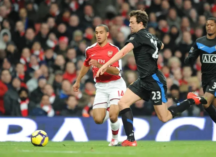 Framed Print : Theo Walcott (Arsenal) Jonny Evans (Man United). Arsenal 1: 3 Manchester United Framed Print : Theo Walcott (Arsenal) Jonny Evans (Man United). Arsenal 1: 3 Manchester United