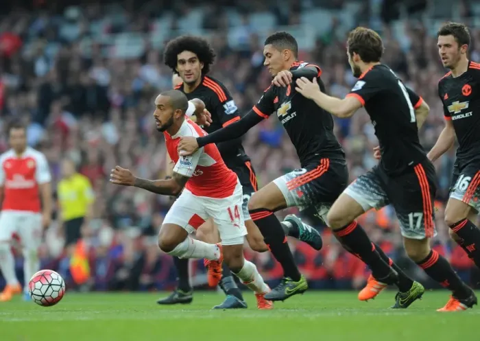 Framed Print : Theo Walcott (Arsenal) Marouane Fellaini, Chris Smalling and Daley Blind (Man Utd) Framed Print : Theo Walcott (Arsenal) Marouane Fellaini, Chris Smalling and Daley Blind (Man Utd)