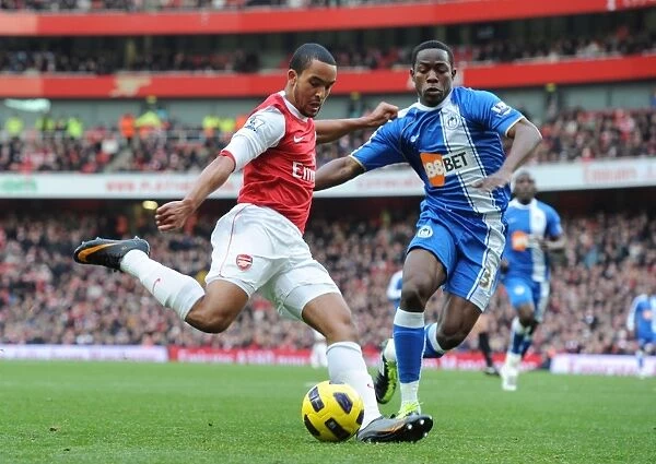 Theo Walcott (Arsenal) Maynor Figueroa (Wigan). Arsenal 3: 0 Wigan Athletic