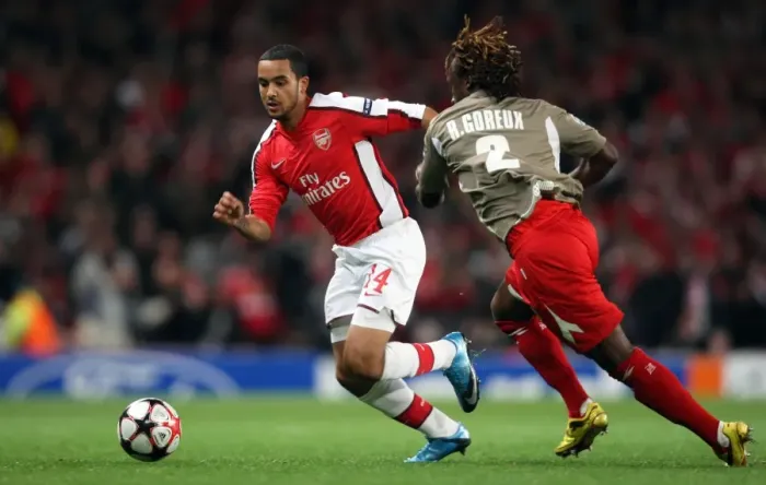 Framed Print : Theo Walcott (Arsenal) Reginal Goreux (Liege) Framed Print : Theo Walcott (Arsenal) Reginal Goreux (Liege)
