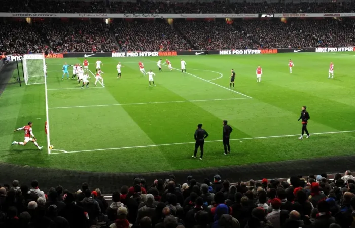 Framed Print : Theo Walcott (Arsenal) takes a corner during the match. Arsenal 0: 2 Swansea. Barclays Framed Print : Theo Walcott (Arsenal) takes a corner during the match. Arsenal 0: 2 Swansea. Barclays