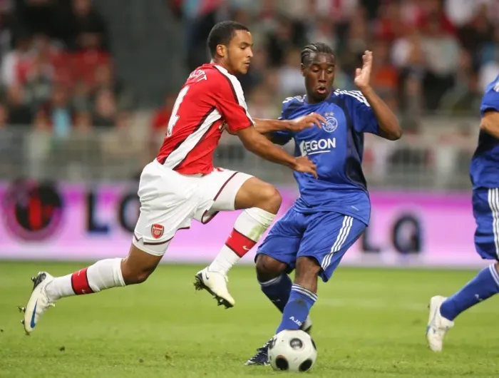 Framed Print : Theo Walcott (Arsenal) Vurnon Anita (Ajax) Framed Print : Theo Walcott (Arsenal) Vurnon Anita (Ajax)