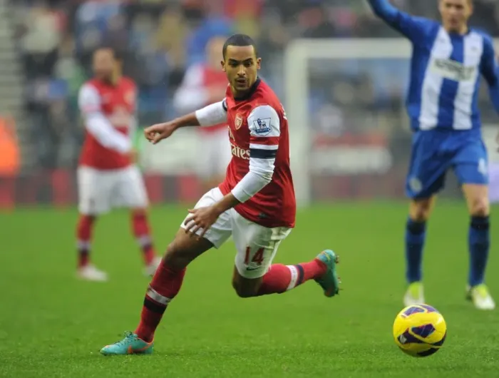 Framed Print : Theo Walcott (Arsenal). Wigan Athletic 0: 1 Arsenal. Barclays Premier League. The DW Stadium Framed Print : Theo Walcott (Arsenal). Wigan Athletic 0: 1 Arsenal. Barclays Premier League. The DW Stadium