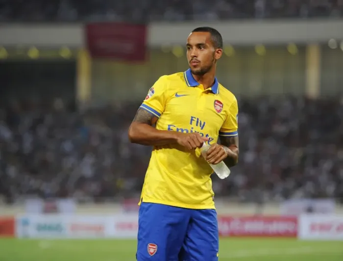 Framed Print : Theo Walcott Awaits Substitution: Vietnam vs. Arsenal (2013)