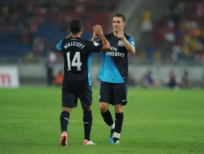 Framed Print : Theo Walcott celebrates scoring the 2nd Arsenal goal with Aaron Ramsey Framed Print : Theo Walcott celebrates scoring the 2nd Arsenal goal with Aaron Ramsey