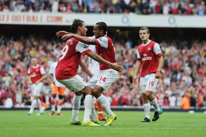 Framed Print : Theo Walcott celebrates scoring the 3rd Arsenal goal with Marouane Chamakh Framed Print : Theo Walcott celebrates scoring the 3rd Arsenal goal with Marouane Chamakh