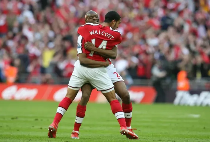Framed Print : Theo Walcott celebrates scoring the Arsenal goal with Abou Diaby