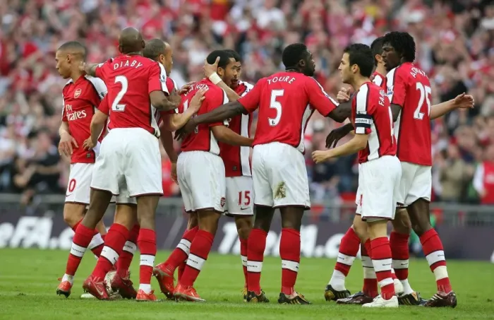 Framed Print : Theo Walcott celebrates scoring the Arsenal goal with Abou Diaby