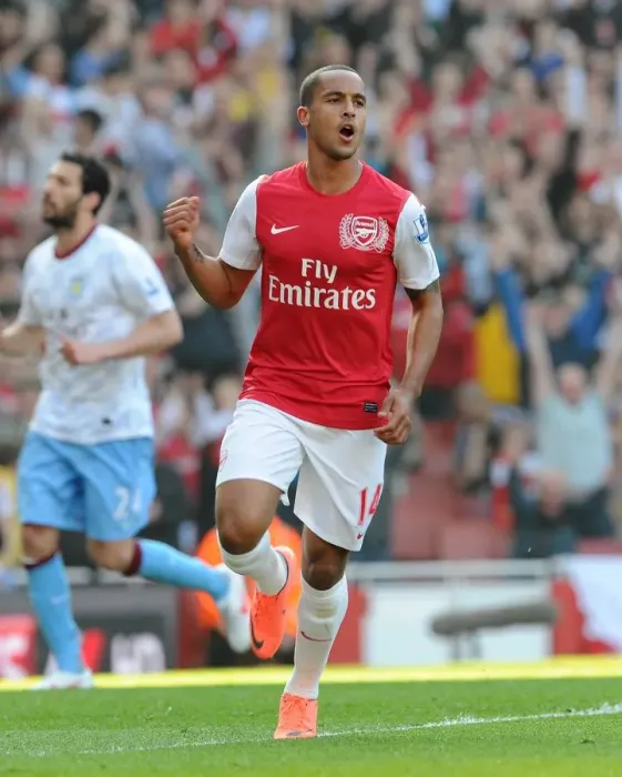 Framed Print : Theo Walcott celebrates scoring Arsenals 2nd goal. Arsenal 3: 0 Aston Villa