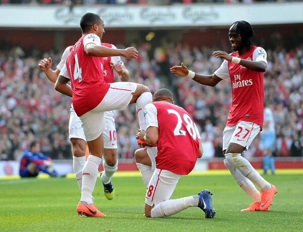 Theo Walcott celebrates scoring Arsenals 2nd goal with Kieran Gibbs and Gervinho