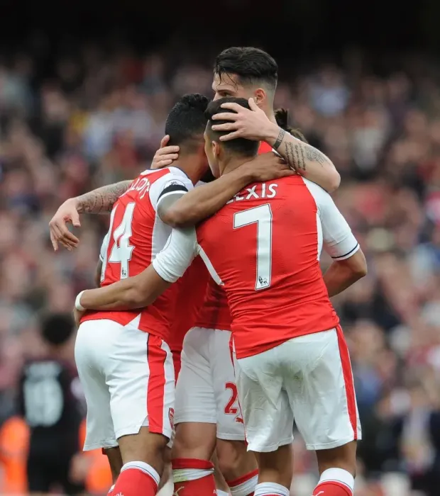 Framed Print : Theo Walcott celebrates scoring a goal for Arsenal with Alexis Sanchez and Granit Xhaka