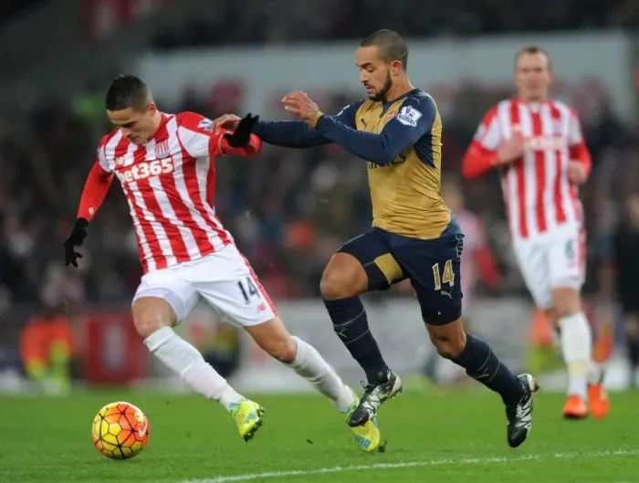 Framed Print : Theo Walcott Chases Down Ibrahim Afellay: Thrilling Moment from Stoke City vs. Arsenal (2015-16)