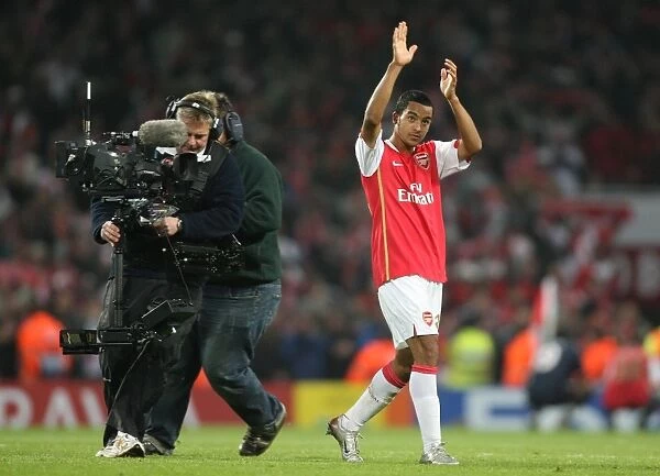 Theo Walcott claps the fans at the end of the match