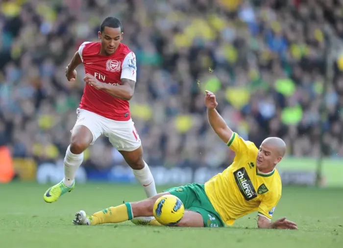 Framed Print : Theo Walcott Dashes Past Marc Tierney: Norwich City vs Arsenal, Premier League 2011-12 Framed Print : Theo Walcott Dashes Past Marc Tierney: Norwich City vs Arsenal, Premier League 2011-12