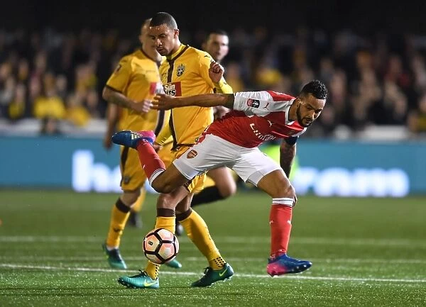 Theo Walcott Dodges Past Craig Eastmond: Sutton United vs. Arsenal in The Emirates FA Cup Fifth Round