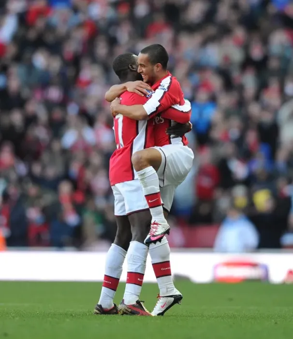 Framed Print : Theo Walcott and Emmanuel Eboue: Celebrating Arsenal's 3-1 Victory Over Burnley Framed Print : Theo Walcott and Emmanuel Eboue: Celebrating Arsenal's 3-1 Victory Over Burnley