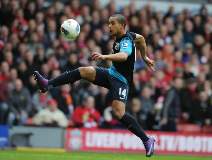 Framed Print : Theo Walcott Faces Liverpool: Premier League Showdown (2011-12)