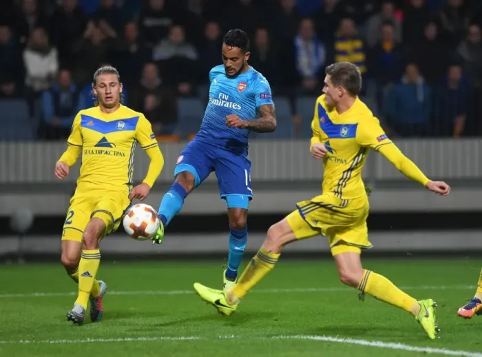 Framed Print : Theo Walcott Faces Off Against Volodko and Gaiduchik in Arsenal's UEFA Europa League Clash vs. BATE Borisov