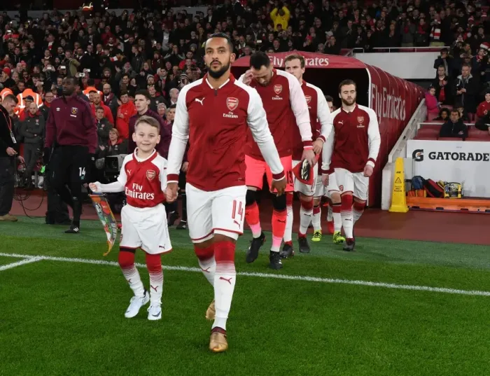 Framed Print : Theo Walcott Leads Arsenal Out against West Ham United in Carabao Cup Quarterfinal Framed Print : Theo Walcott Leads Arsenal Out against West Ham United in Carabao Cup Quarterfinal