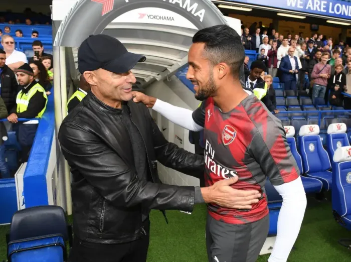 Framed Print : Theo Walcott and Mark Strong: A Unique Encounter Before the Chelsea vs. Arsenal Premier League Match