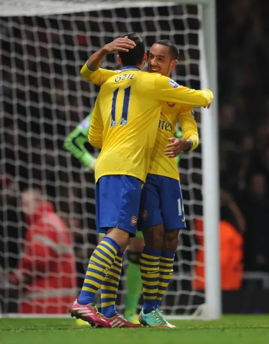 Framed Print : Theo Walcott and Mesut Ozil Celebrate Goals: West Ham United vs. Arsenal (2013-14)