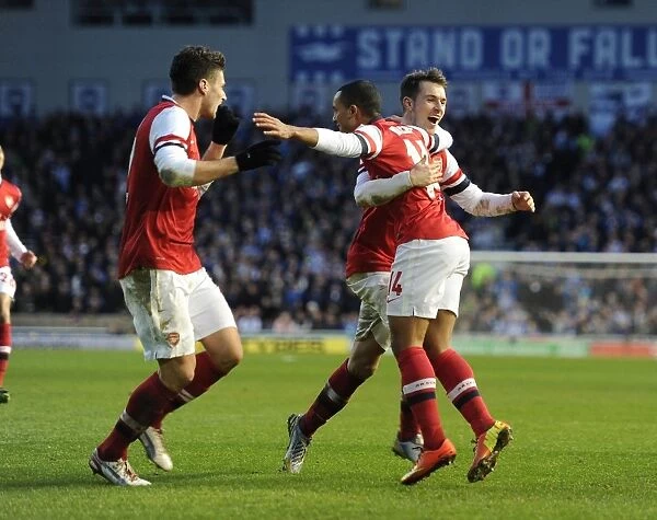 Theo Walcott, Olivier Giroud, and Aaron Ramsey Celebrate Arsenal's Goals Against Brighton & Hove Albion in FA Cup Match