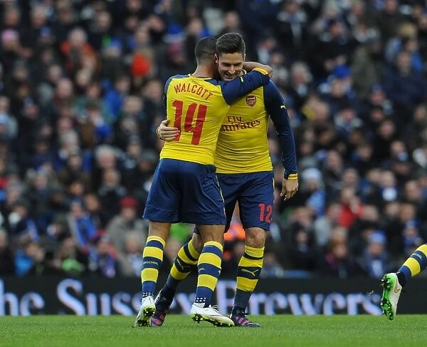 Theo Walcott and Olivier Giroud Celebrate Arsenal's First Goal Against Brighton & Hove Albion in FA Cup Fourth Round
