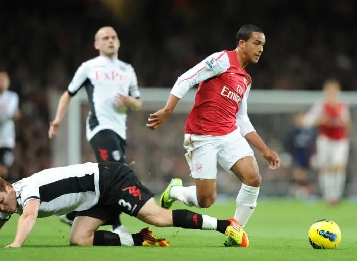 Framed Print : Theo Walcott Outmaneuvers John Arne Riisse: Arsenal vs Fulham, Premier League 2011-12