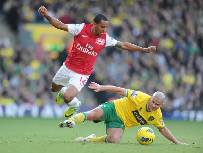 Framed Print : Theo Walcott Outmaneuvers Marc Tierney: A Premier League Moment, 2011-12 Framed Print : Theo Walcott Outmaneuvers Marc Tierney: A Premier League Moment, 2011-12