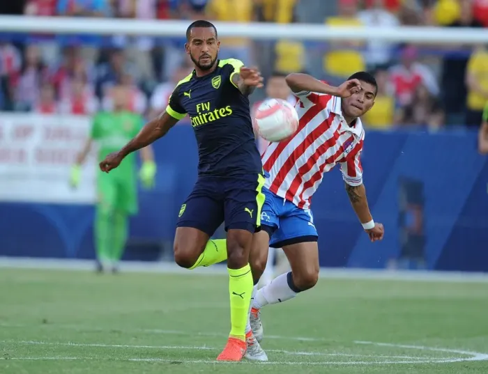 Framed Print : Theo Walcott Outmaneuvers Orbelin Pineda: Arsenal's Pre-Season Triumph vs. Chivas Framed Print : Theo Walcott Outmaneuvers Orbelin Pineda: Arsenal's Pre-Season Triumph vs. Chivas