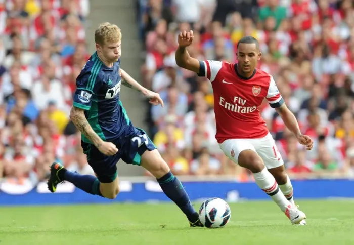 Framed Print : Theo Walcott Outpaces Rival James McClean: Arsenal's Winning Moment vs. Sunderland (2012-13) Framed Print : Theo Walcott Outpaces Rival James McClean: Arsenal's Winning Moment vs. Sunderland (2012-13)