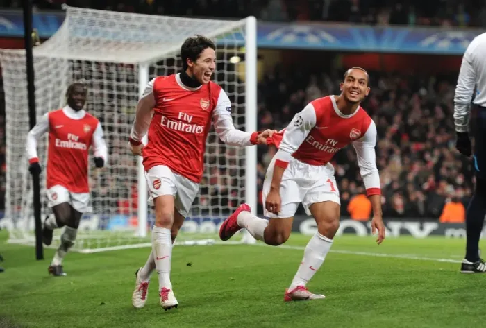 Framed Print : Theo Walcott and Samir Nasri: Arsenal's Dynamic Duo Celebrates Goal in Arsenal 3-1 Victory over Partizan Belgrade, UEFA Champions League, Emirates Stadium