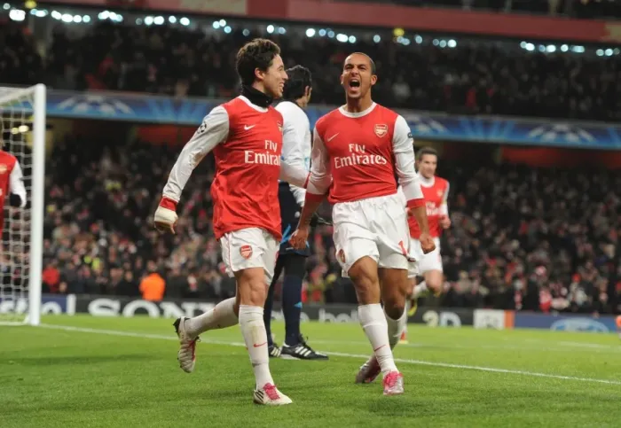Framed Print : Theo Walcott and Samir Nasri Celebrate Arsenal's Second Goal vs. Partizan Belgrade in the UEFA Champions League